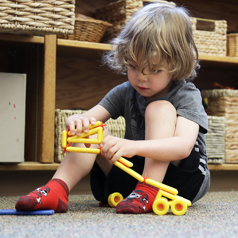 Scene showing student in the HCNS Indoor Classroom